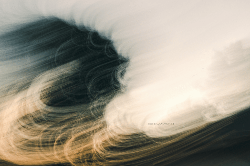 Nebraska Sunset using camera movement for an abstract photograph by Brenda Landrum